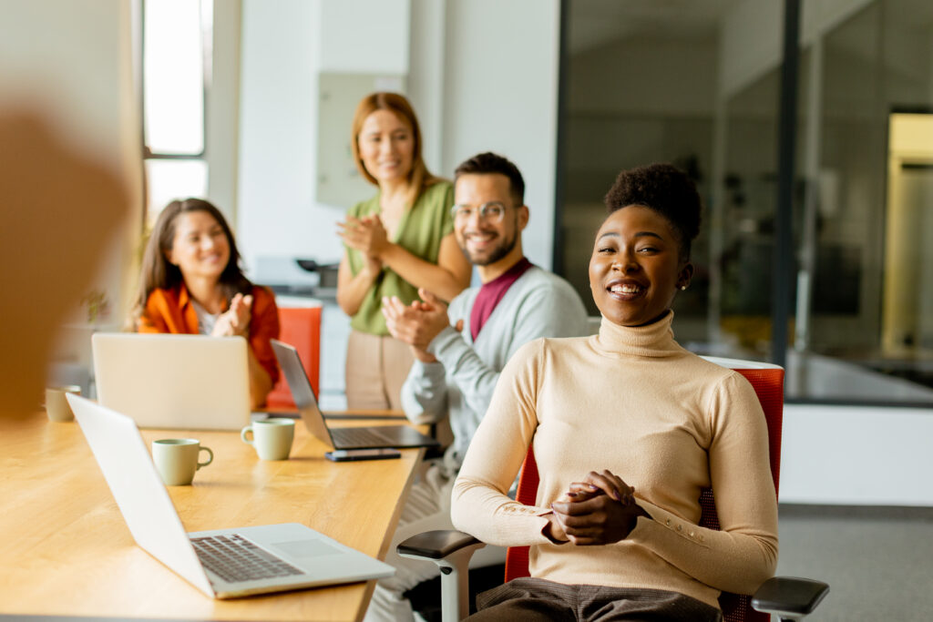 Employees working happily at the office